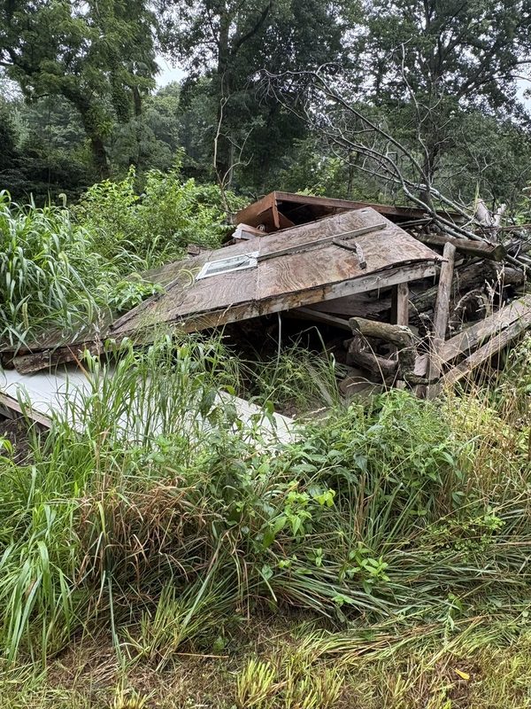Collapsed shed pulled out of the treeline, a real J.E. Ward job in Central Illinois